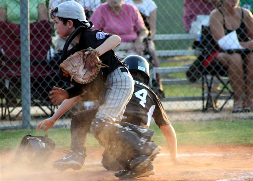 Ben goes for the ball but the runner is safe