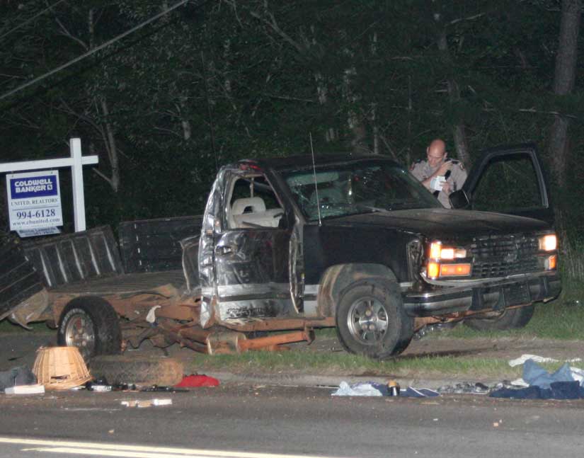 A Florida Highway Patrol trooper investigates