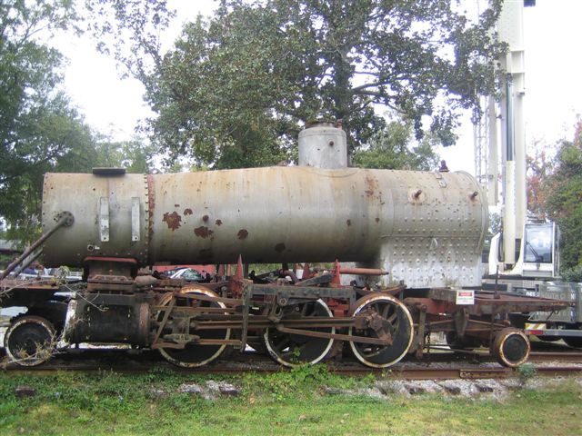 The boiler has to be lifted and placed on the ground, allowing access to the undercarriage for sandblasting and painting