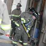 Shoveling Soybeans Away From Silo