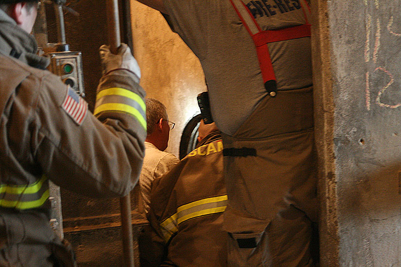 Firemen Working On Rescue Plan