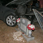 Car Plows Through Cemetery