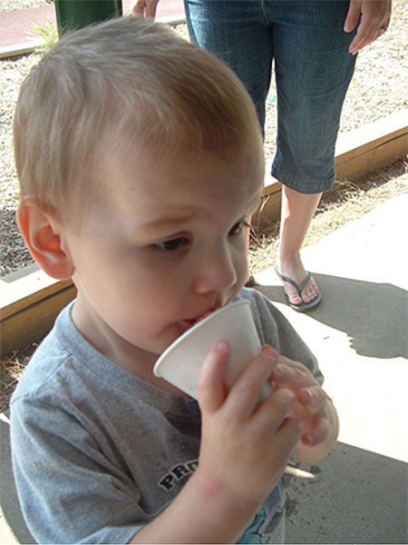 Caleb Murphy, age 2, enjoying a snowcone