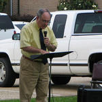 Rev. Jim Reece praying for the military