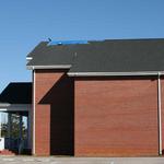 Tarp covers Highland roof