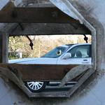 Look through steeple at car