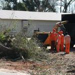 County road prison crew cleans up