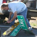 Twisted street sign replaced
