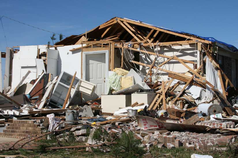 Damage remains under blue skies