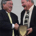 Joe Thomas, winner and Larry White, presenter