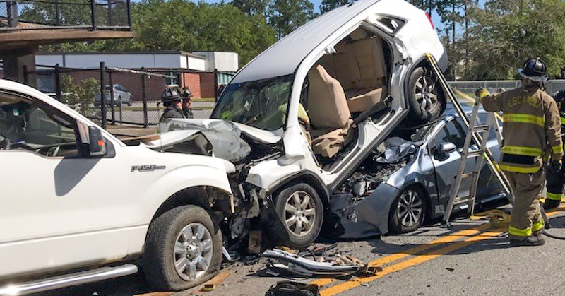 Four Injured In Davis Highway Crash; Suv Ends Up On Top Of Car 